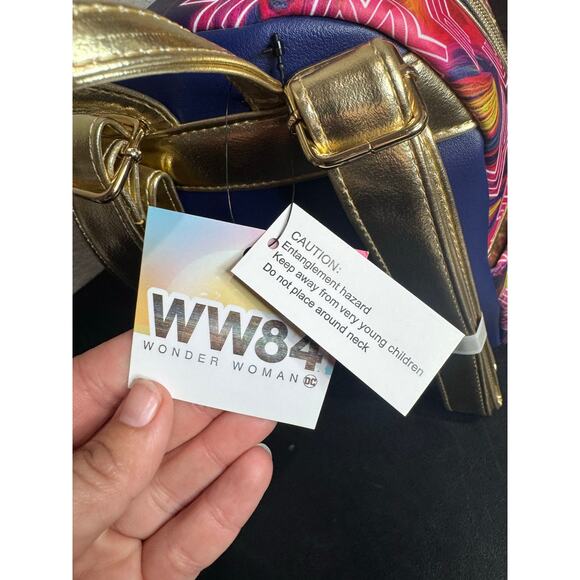 Loungefly WW84 Wonder Women Entertainment Earth Exclusive Mini Backpack NWT